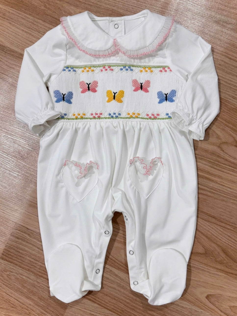 Girls hand smocked butterfly babygrow