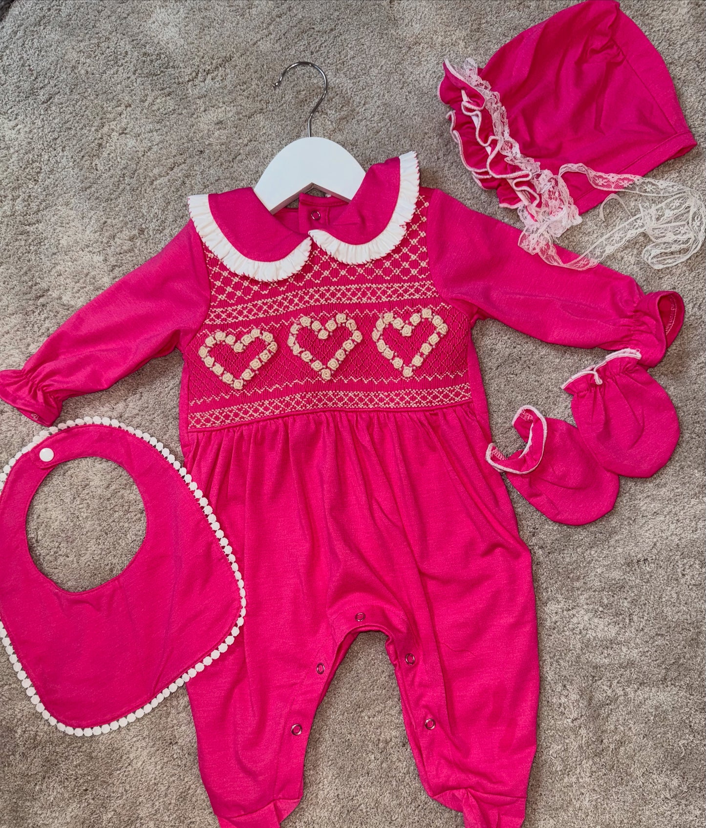 Girls pink heart hand smocked babygrow set